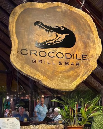 Crocodile Grill restaurant sign at Villas Río Mar in Dominical, Costa Rica