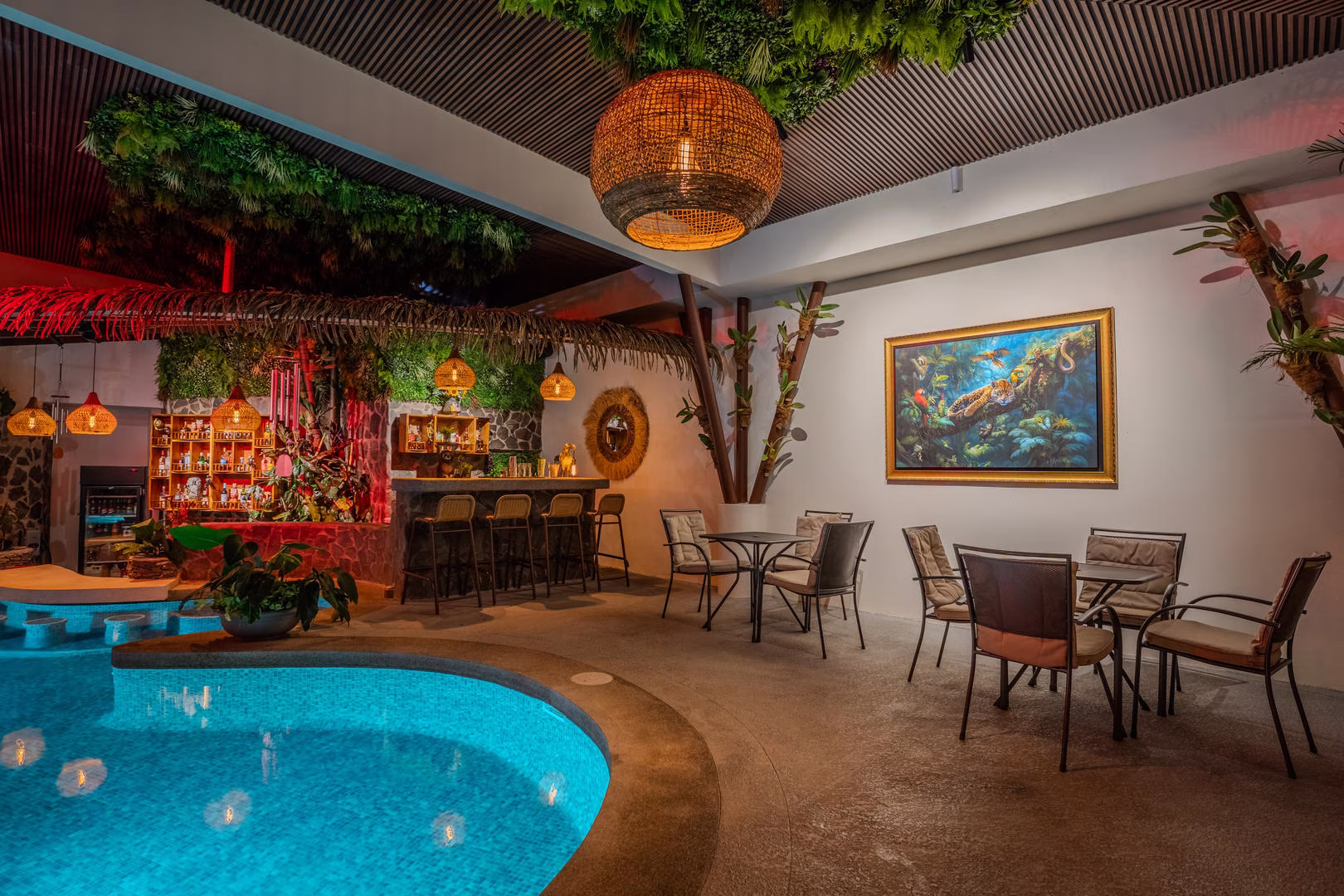 Indoor pool with night lighting at Sibu Boutique Hotel in Monteverde