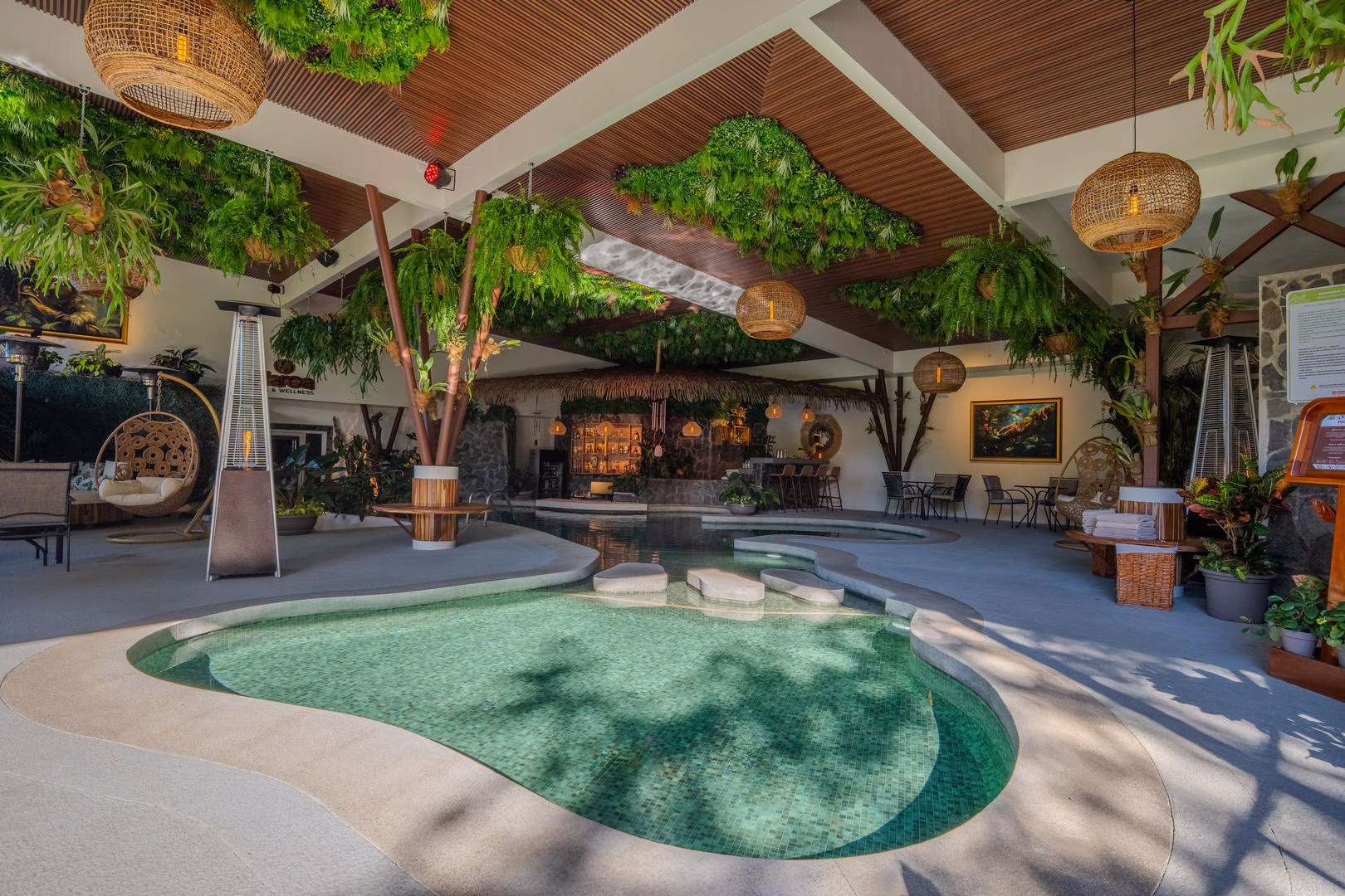 Wide view of indoor pool at Sibu Boutique Hotel in Monteverde