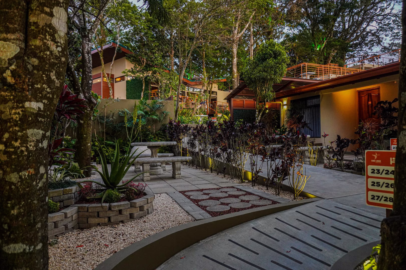Pathways with hotel buildings in background at Sibu Boutique Hotel