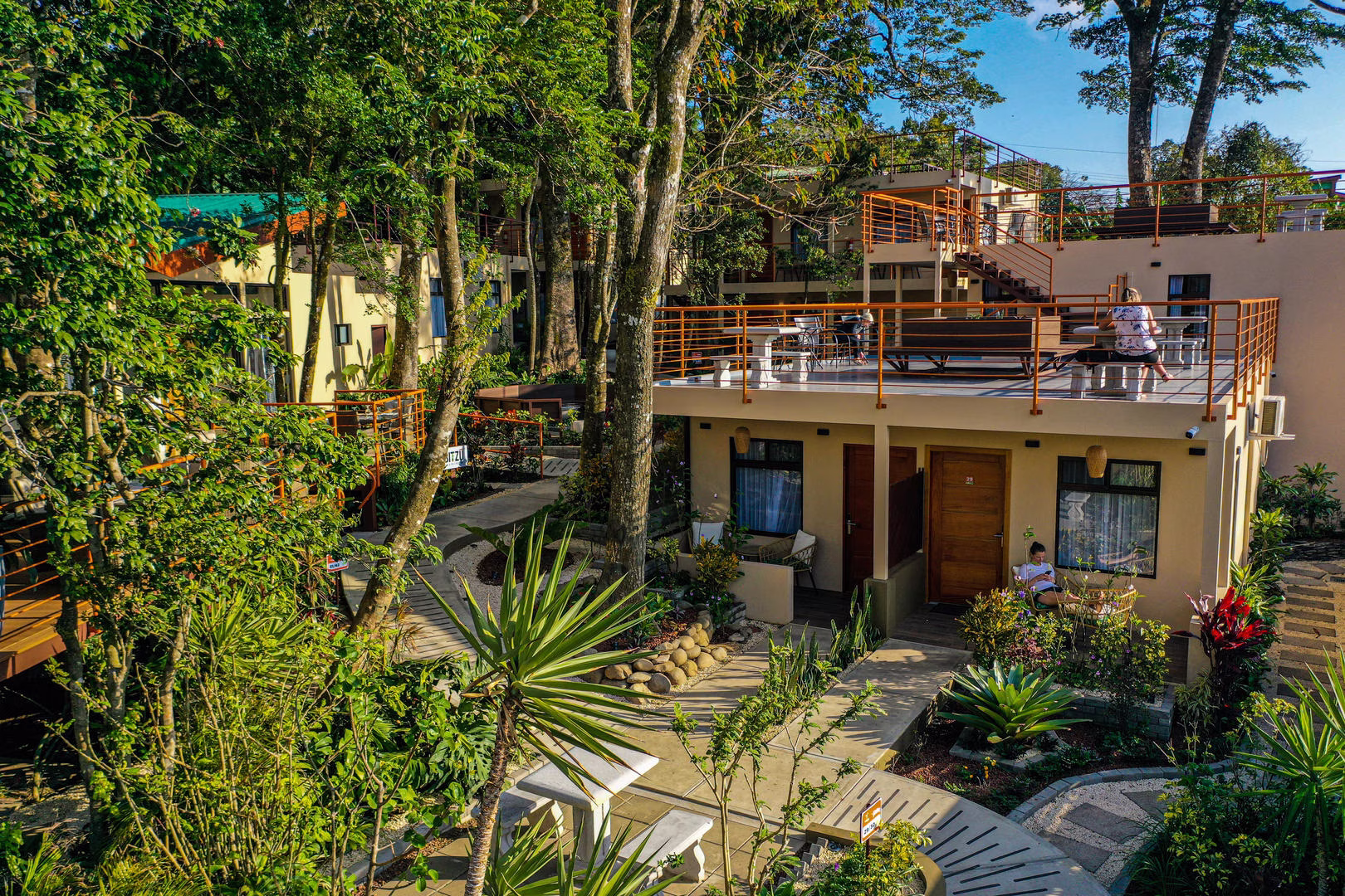 Guests relaxing on terraces at Sibu Boutique Hotel in Monteverde