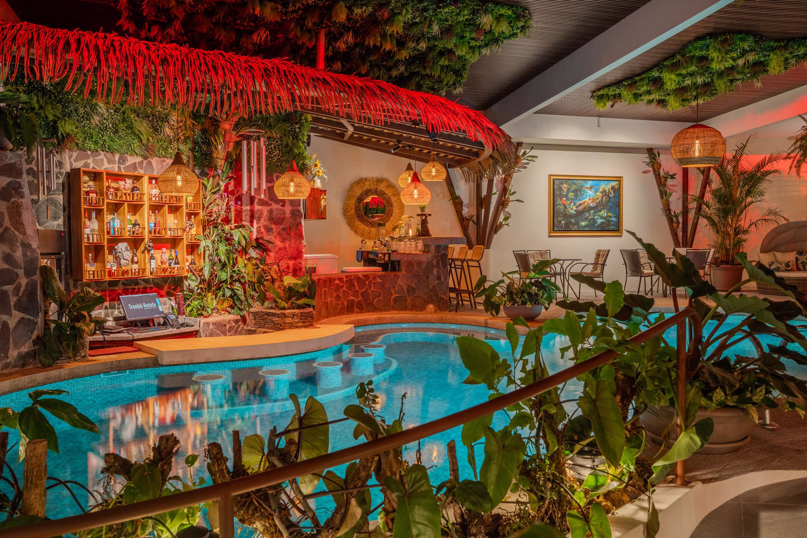 Indoor heated pool with bar at Sibu Boutique Hotel in Monteverde