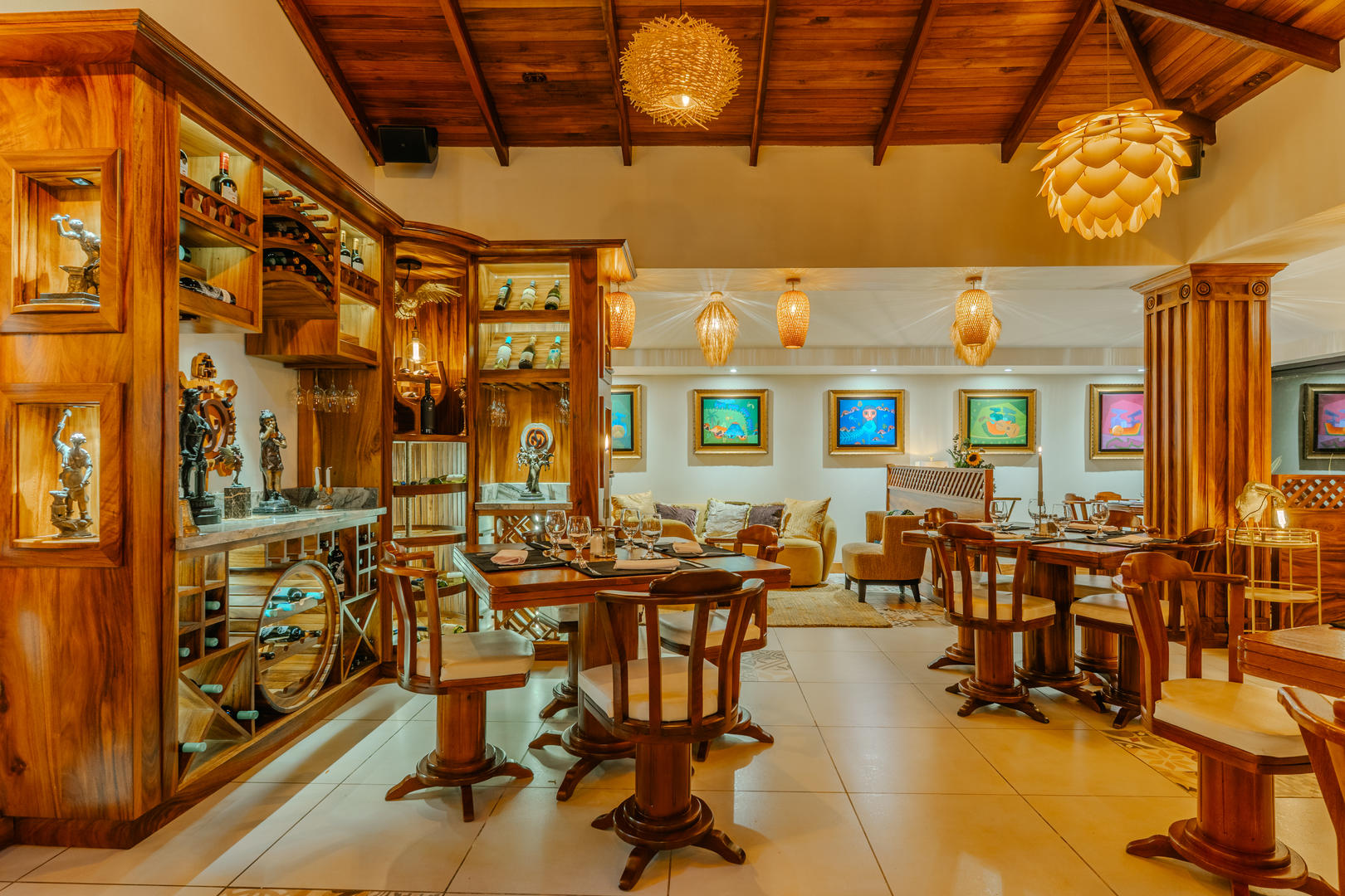 Main dining hall of Otocuma Restaurant featuring elegant wooden interior design at Hotel & Spa Poco a Poco, Monteverde