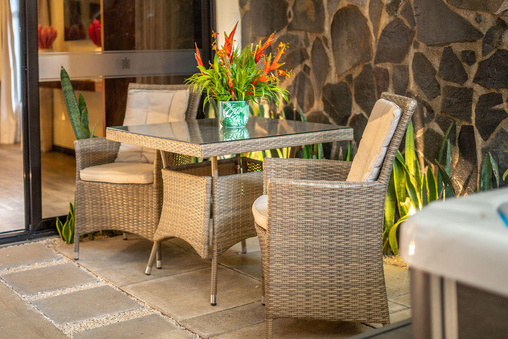 Detail of a small table in the private jacuzzi terrace area in Forest Deluxe with Jacuzzi at Hotel & Spa Poco a Poco, Monteverde