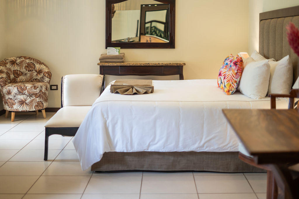 Garden Superior room featuring a king bed at Hotel & Spa Poco a Poco, Monteverde