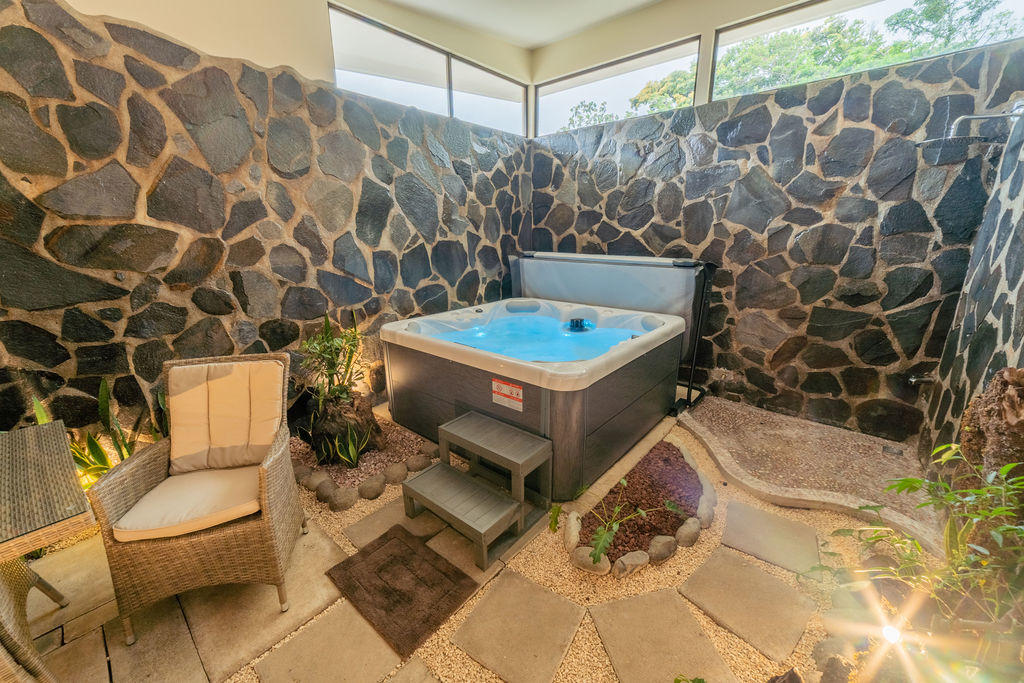 Wide view of the private jacuzzi area in Forest Deluxe with Jacuzzi at Hotel & Spa Poco a Poco, Monteverde