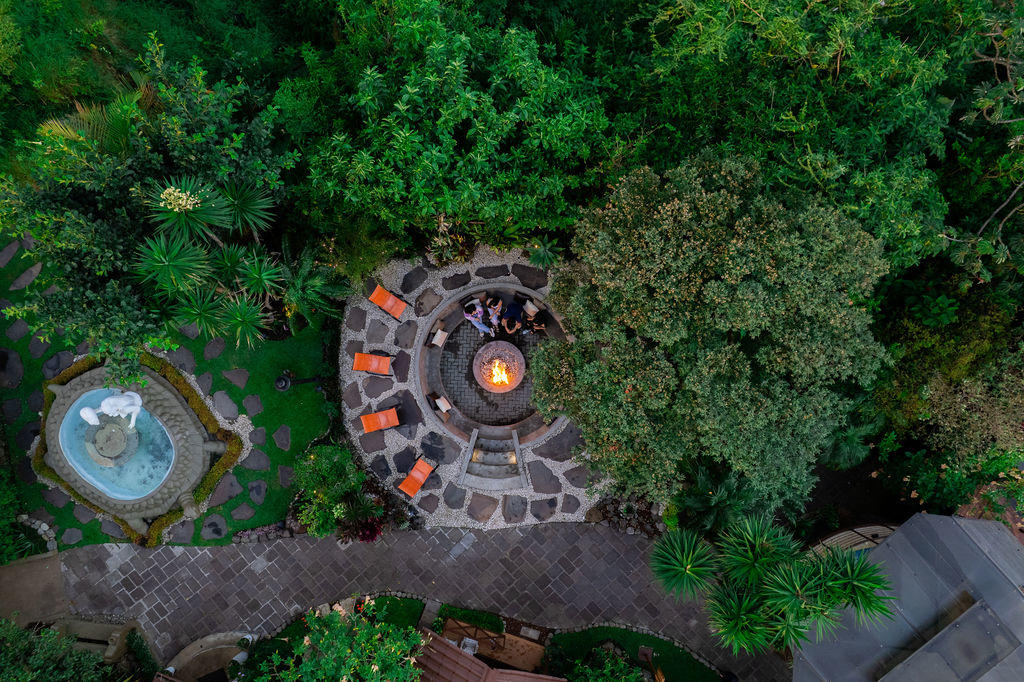 Aerial drone view of the fire pit area at Hotel & Spa Poco a Poco, Monteverde