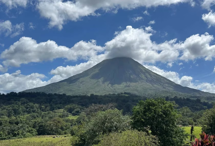 Arenal Volcano view from a farm trail during an ATV tour in La Fortuna, Costa Rica