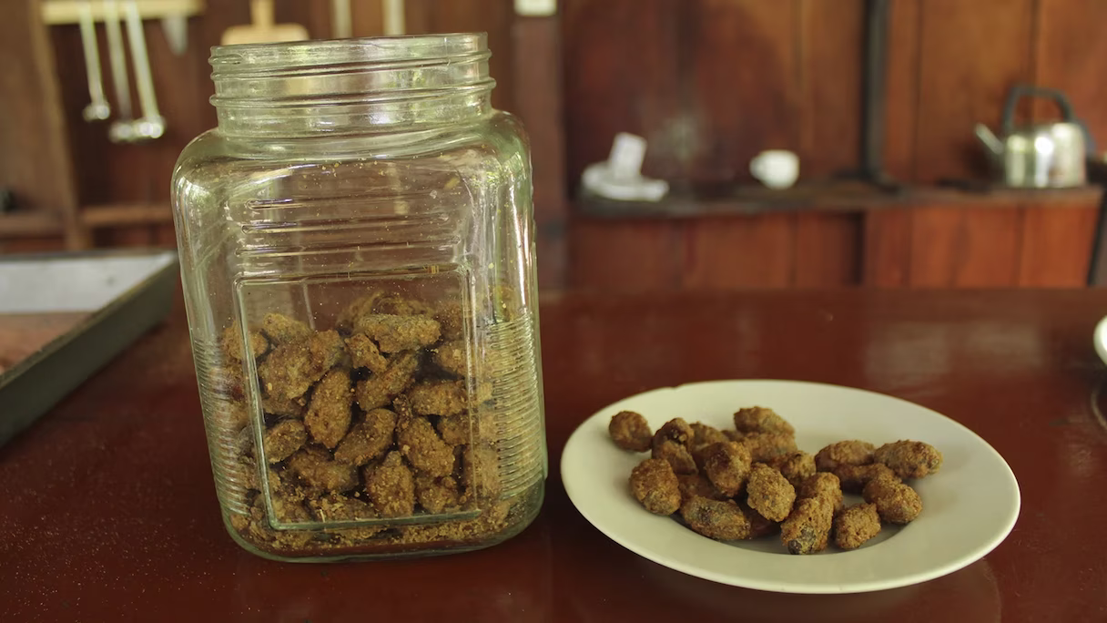 Processed cacao sweets displayed in a glass jar in La Fortuna, San Carlos, Costa Rica