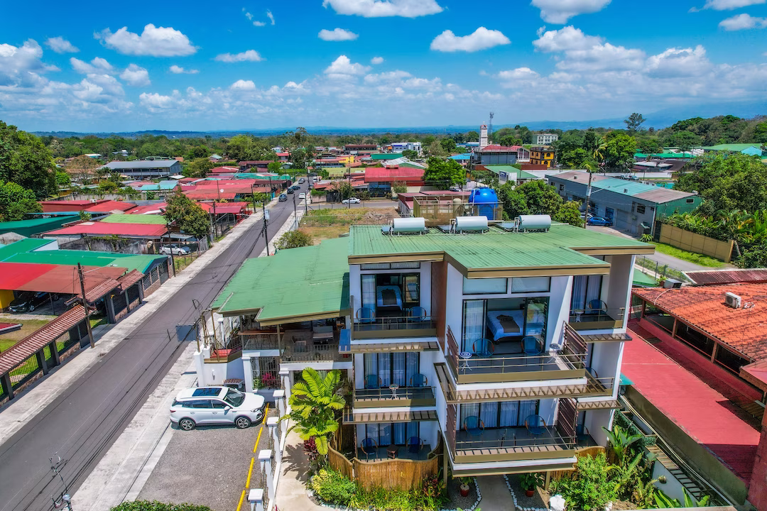 Exterior view of La Fortuna Lodge building with the street in front, La Fortuna, Costa Rica