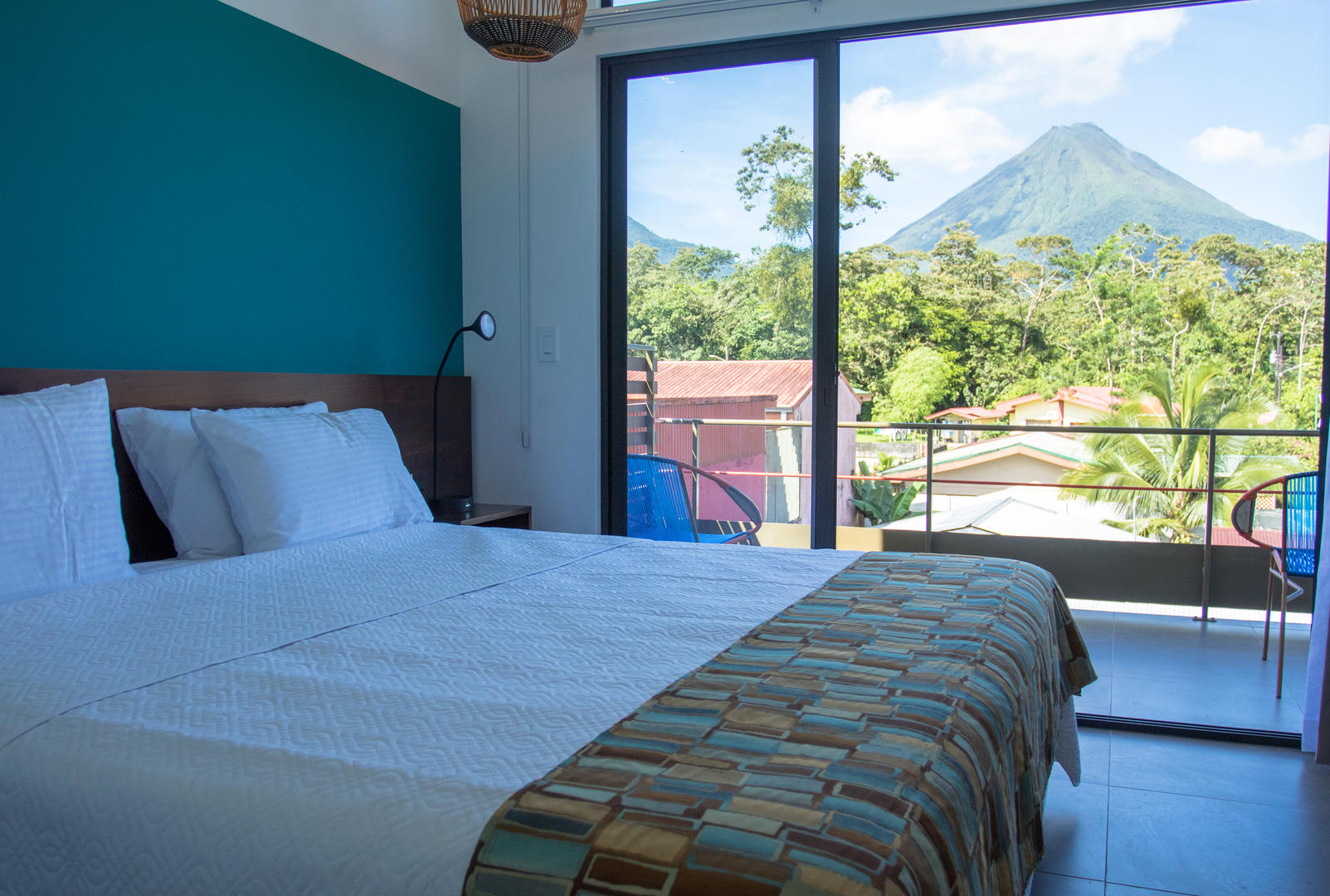 Superior room exterior view of Arenal Volcano on a clear day at La Fortuna Lodge, La Fortuna, Costa Rica