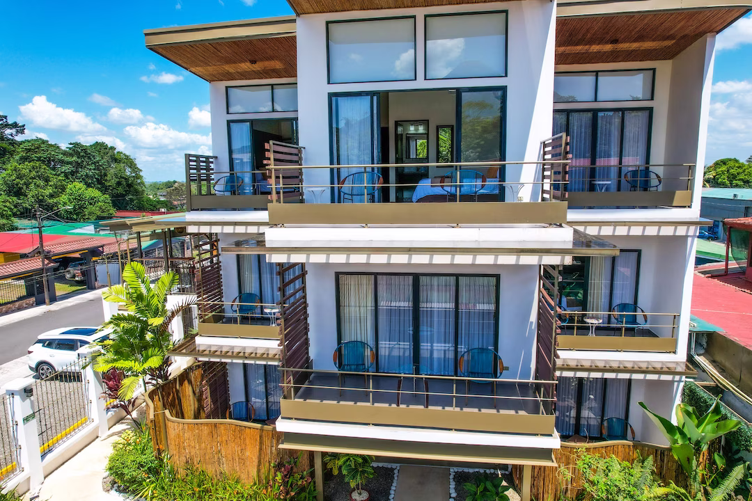Mid level drone view of the lodge building highlighting central floors at La Fortuna Lodge, La Fortuna, Costa Rica