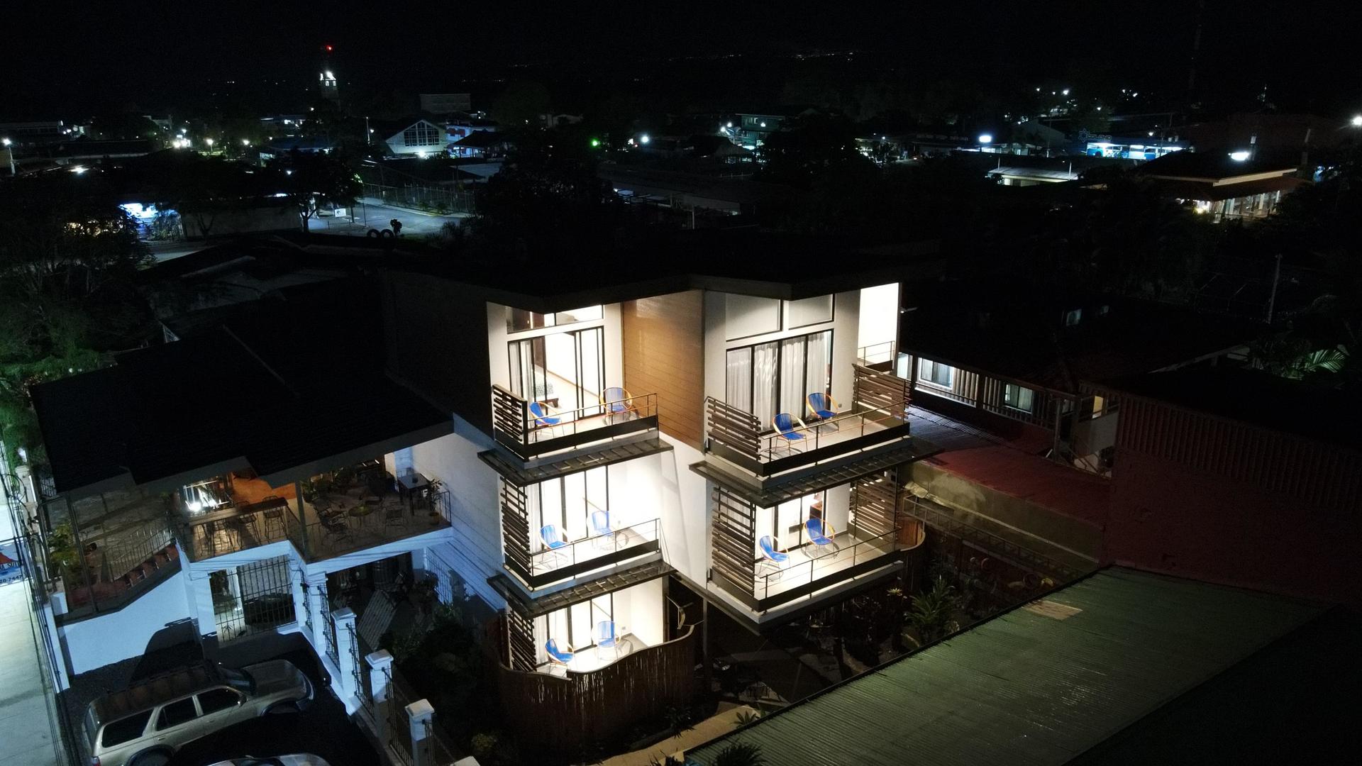 Night view of the illuminated hotel building at La Fortuna Lodge, La Fortuna, Costa Rica
