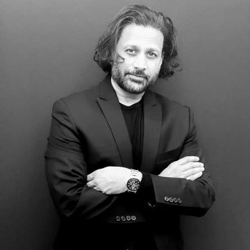 DR. M. K. (BOBBY) BAIG