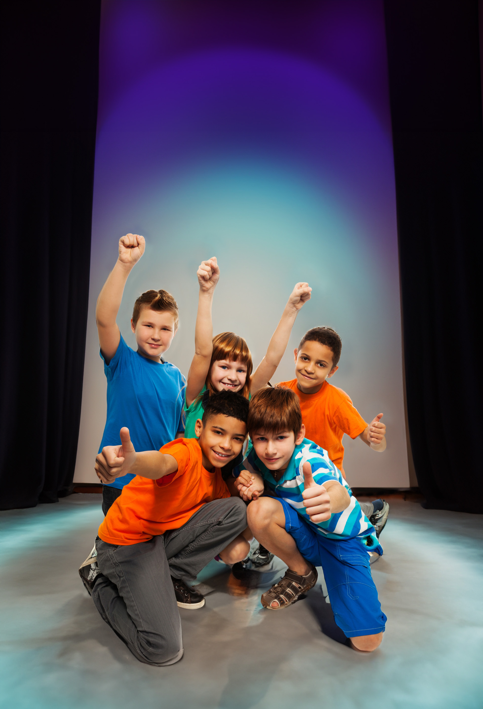 Theatre club lead image - a group of children smiling for the camera