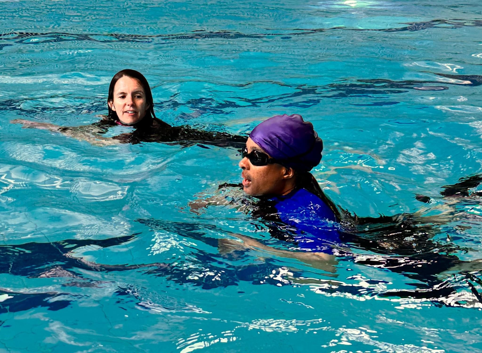 One Volunteer and one Swimmer in the water