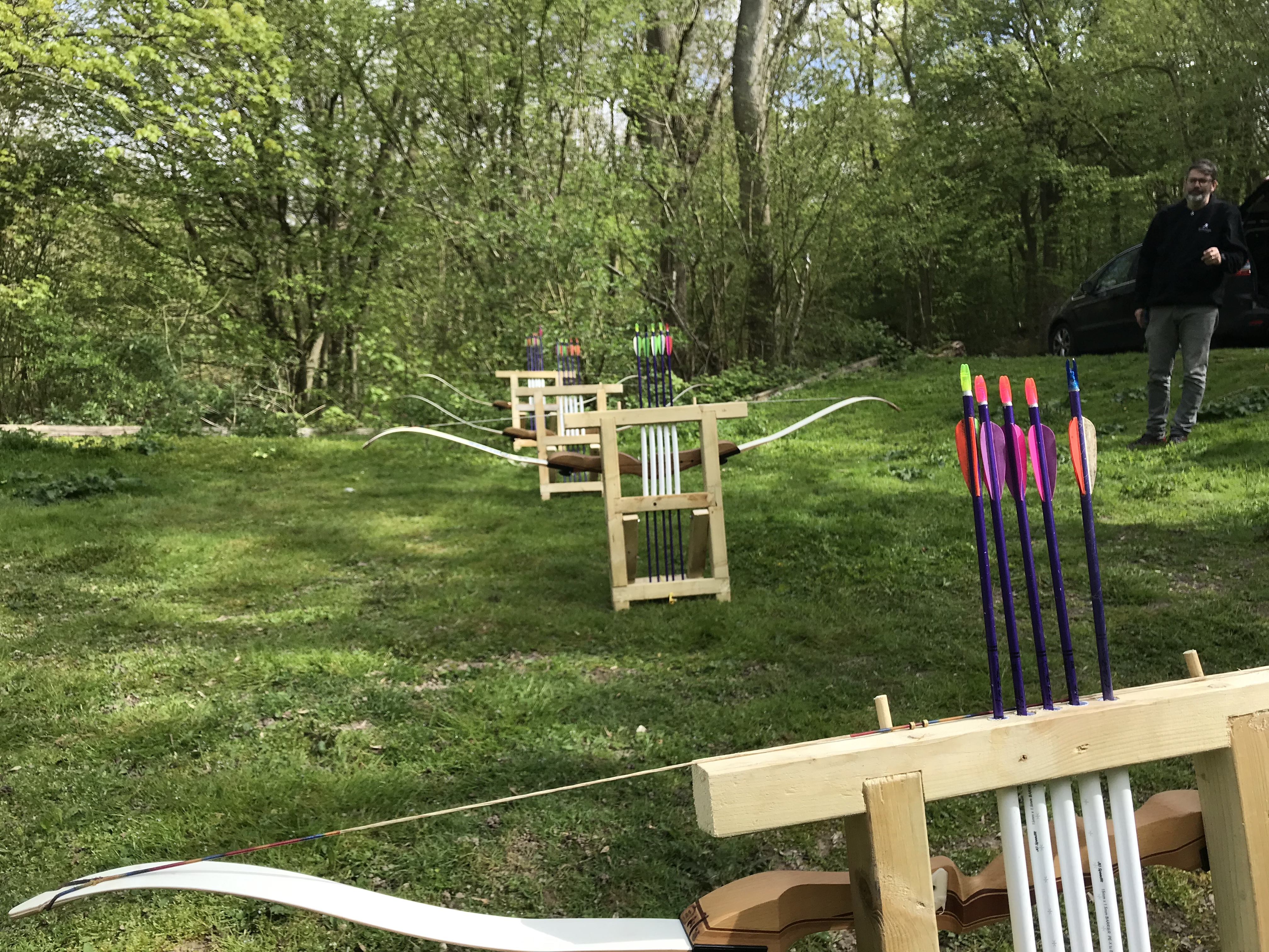 Archery range showing bows and arrows