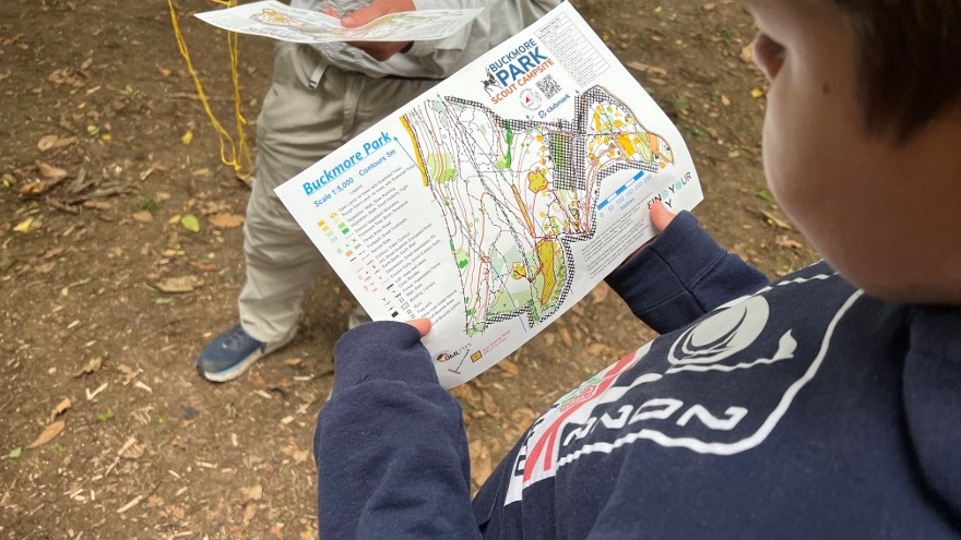 Child holding a map