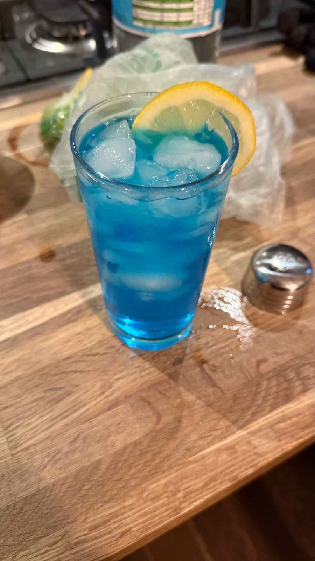 Community photo of a Blue Lagoon cocktail: COCKTAIL DUMP. No.3 of 7 - I personally thought it tasted very similar to a blue Hawaiian but just a bit more refreshing; definitely a fan of this one!