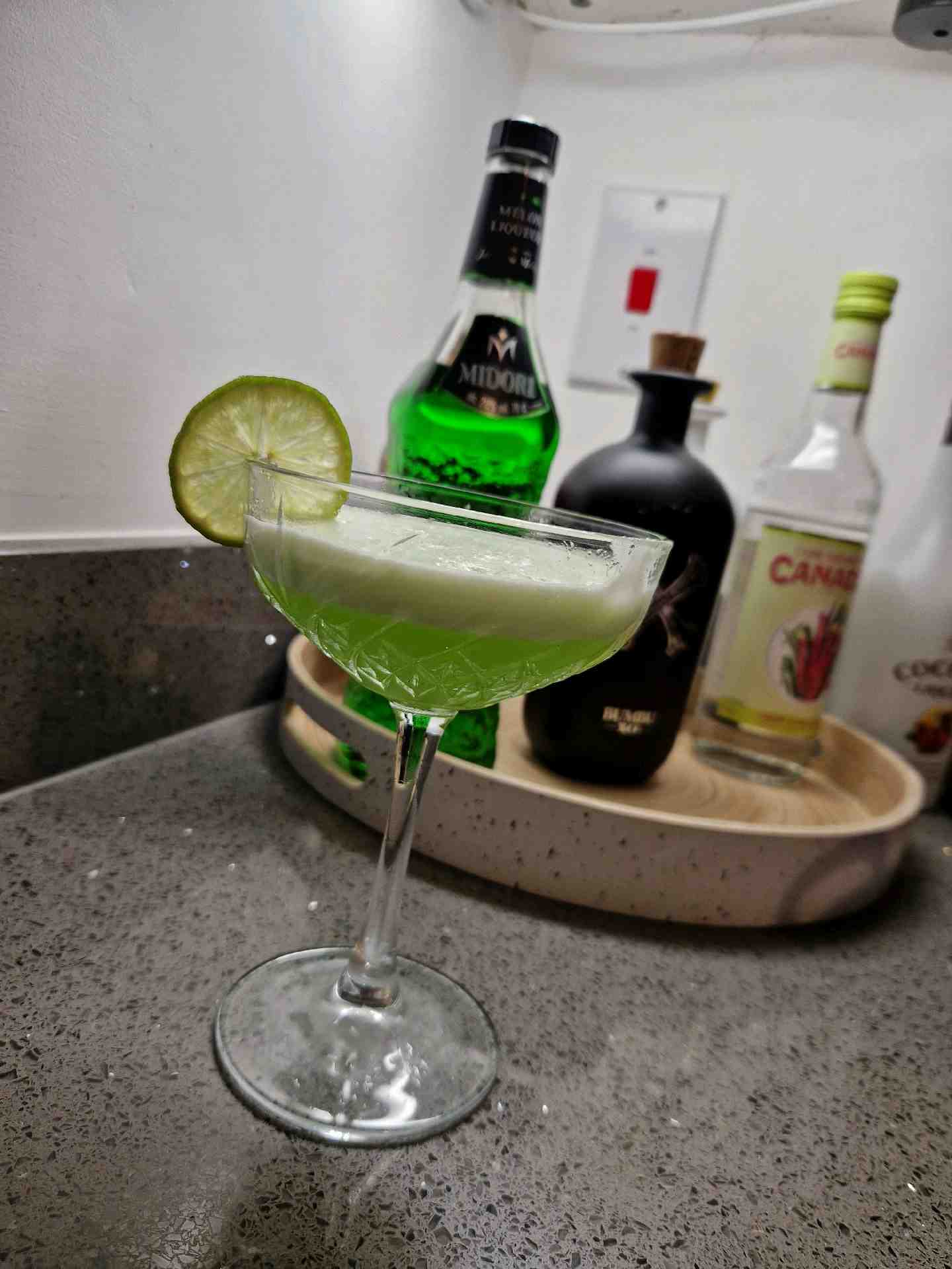 Community photo of a Midori Sour cocktail: Done with raw egg white
Could add some simple syrup to balance out the sour but what a drink