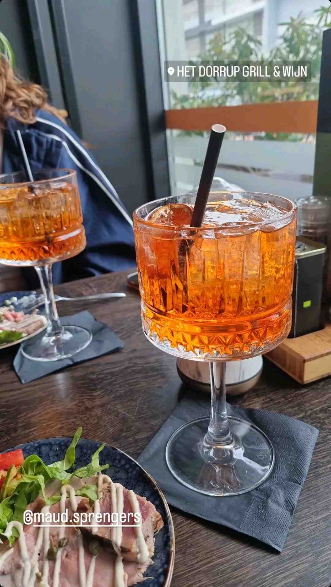 Community photo of a Aperol Spritz cocktail: High cocktail met Maud. Eerste keer een aperol, aan de bittere kant, maar veel lekkerder dan verwacht. Meer iets voor de winter.