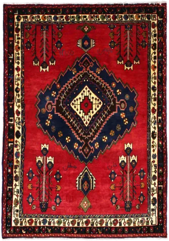 Handmade Persian rug in dimensions 165 centimeters length by 115 centimetres width with mainly Red and Blue colors