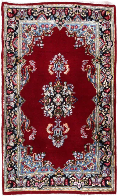 Handmade Persian rug in dimensions 145 centimeters length by 88 centimetres width with mainly Red and Blue colors