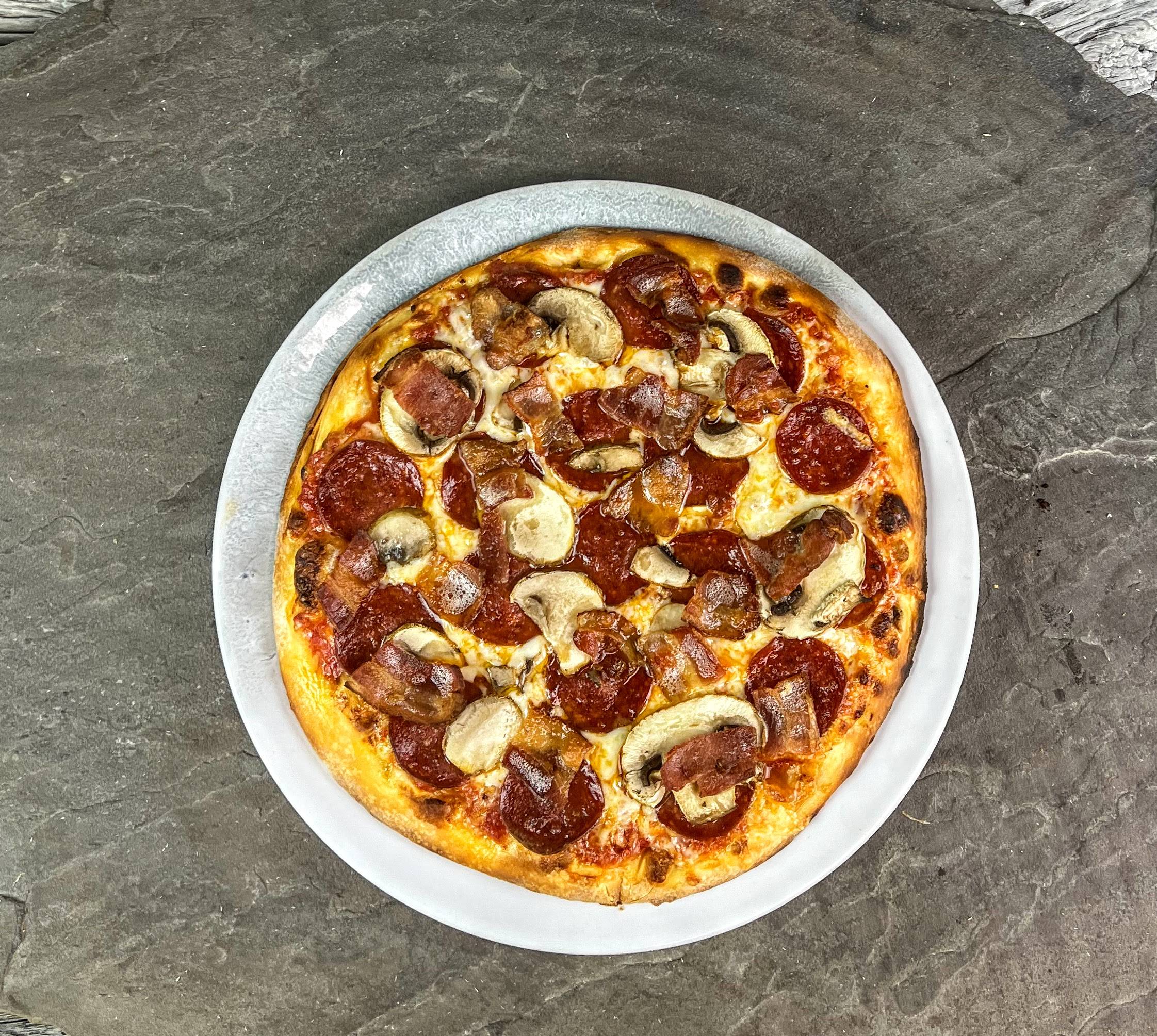 Pepperoni, Mushroom, Bacon Pizza