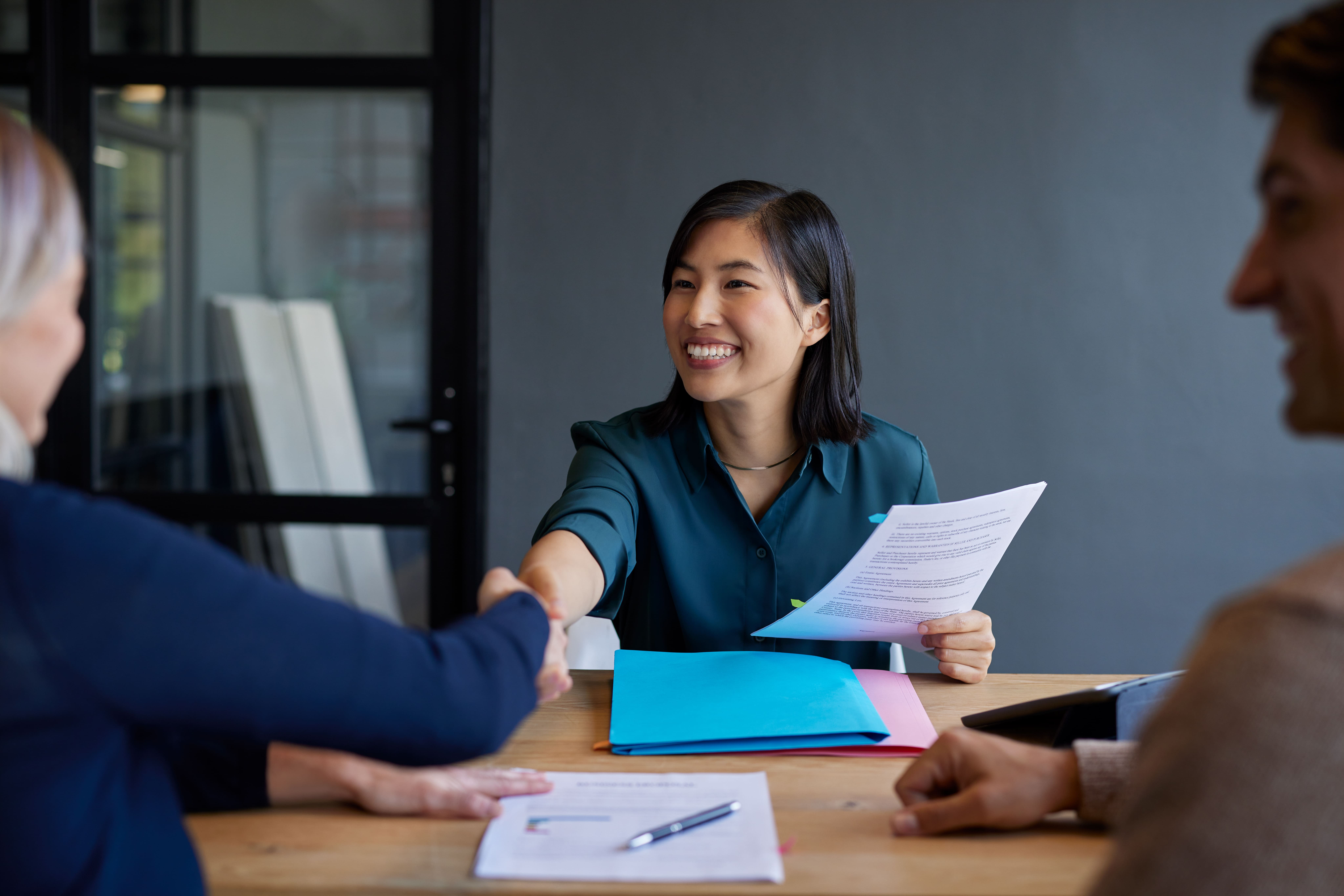 positive-businesswoman-handshake-meeting-in-office-2026-03-16-22-58-24-utc positive-businesswoman-handshake-meeting-in-office-2026-03-16-22-58-24-utc