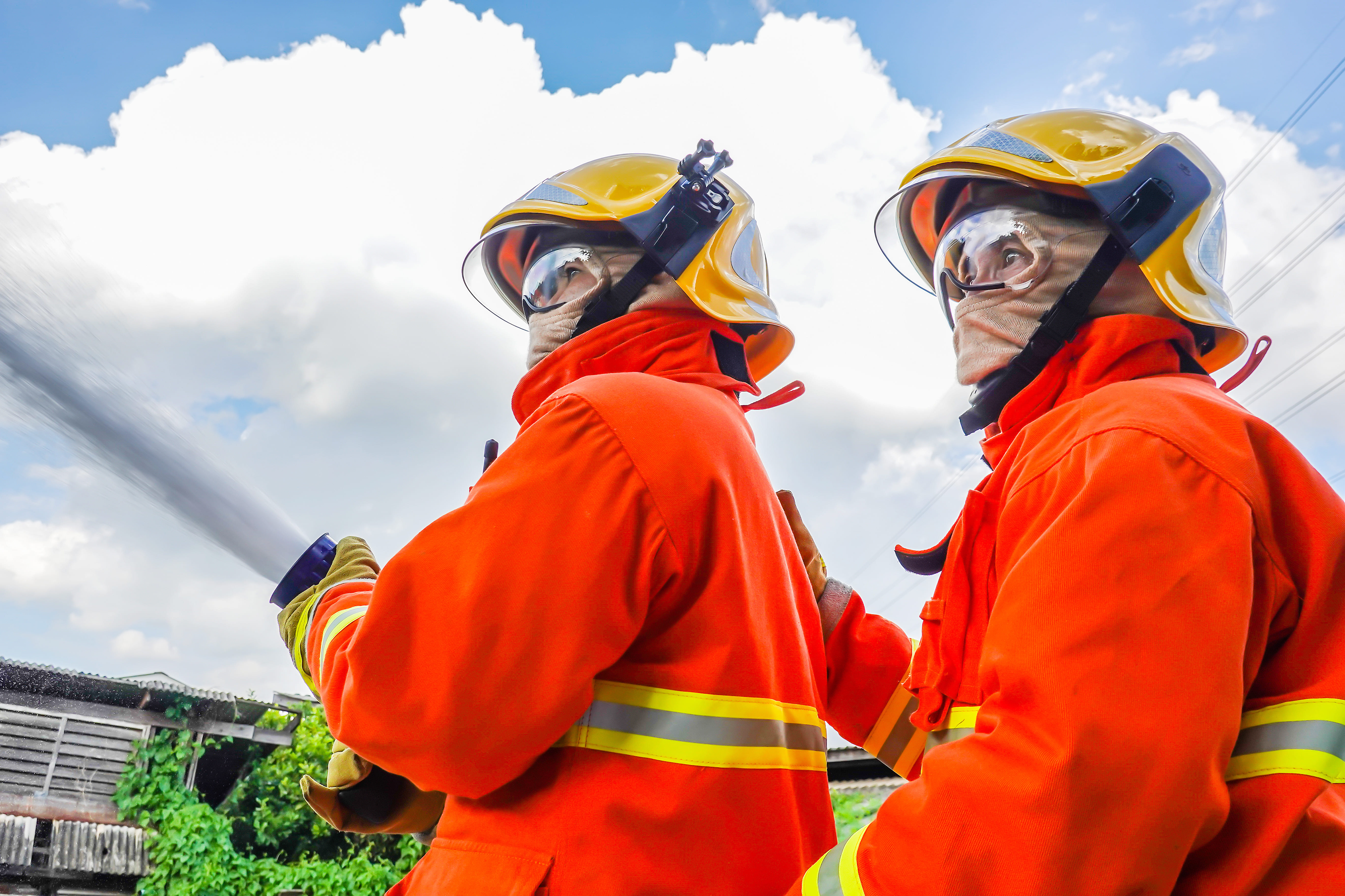 firefighters-handling-high-pressure-water-hose-dur-2026-03-26-22-52-26-utc firefighters-handling-high-pressure-water-hose-dur-2026-03-26-22-52-26-utc