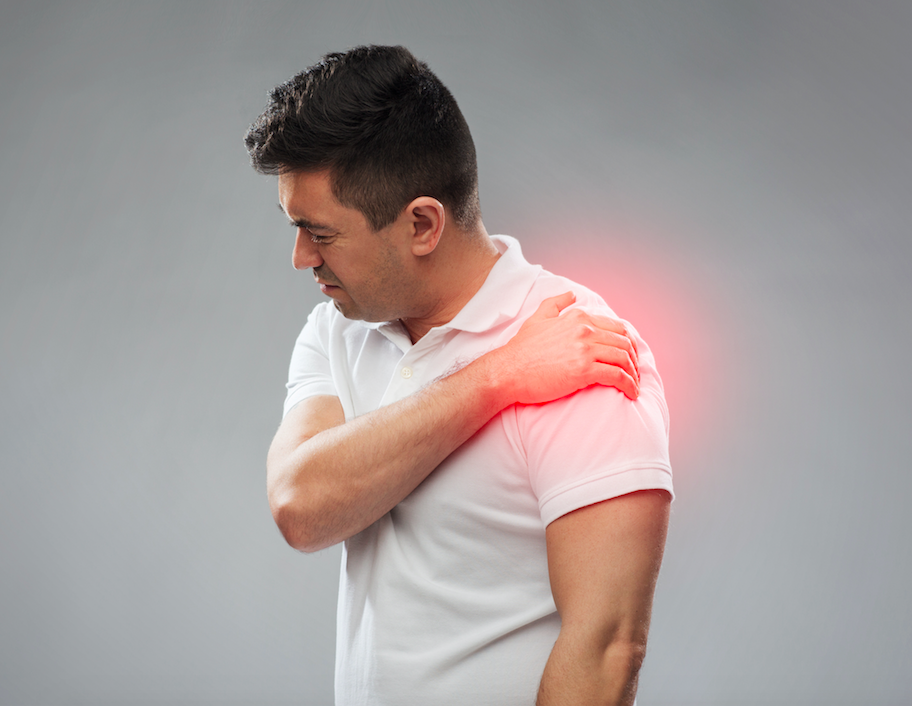 Physiotherapist assessing shoulder mobility at Total Wellness Rehab Brampton