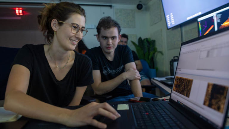 From left are Memorial University doctoral student Caroline Gini and Kraken Robotics’ Jasper Rubin collecting interferometric synthetic aperture sonar (InSAS) data.