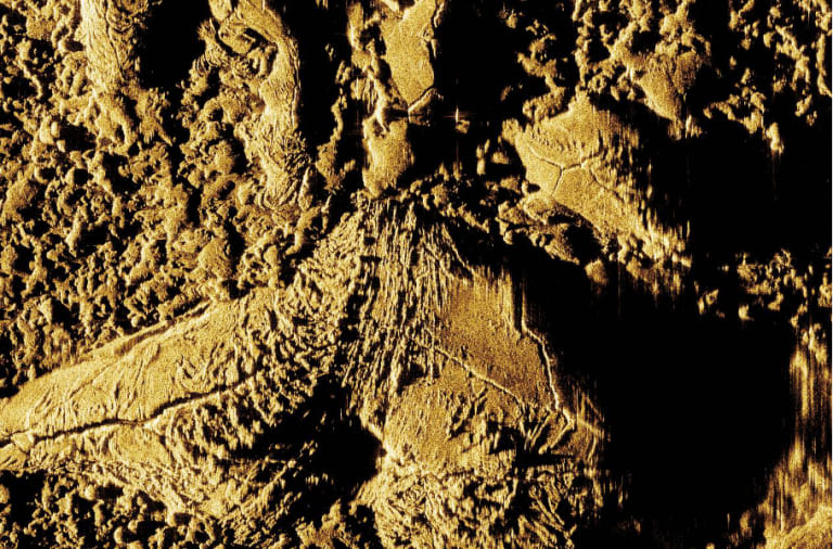 Interferometric synthetic aperture sonar (InSAS) image of solidified lava flows on the seafloor. This image was taken using sound instead of light. Scale: 50 metres from top to bottom