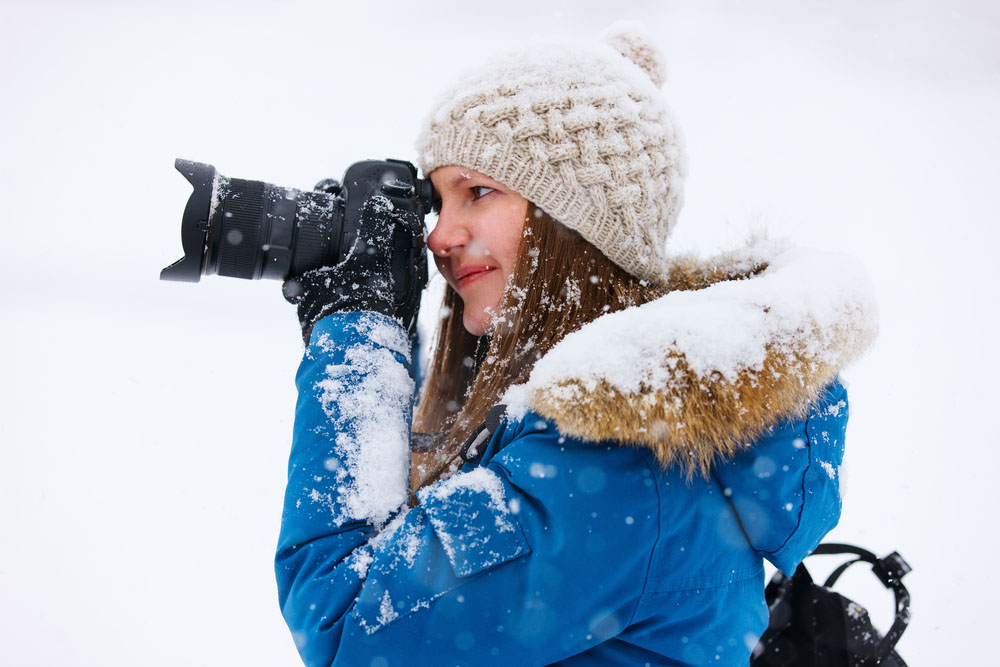 antarctic cruise tips Photographer with gloves and hat - Antarctica