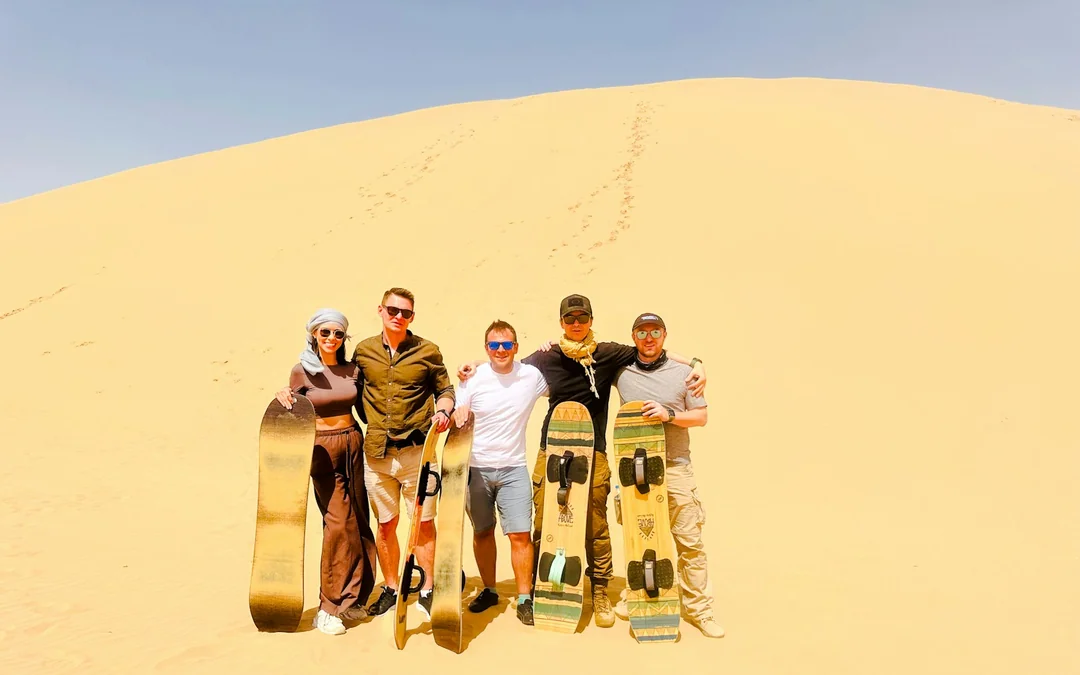 Abu Dhabi Evening Desert Safari with 4x4 Dune Bashing, Camel Ride, BBQ Dinner and Live Shows Image 4