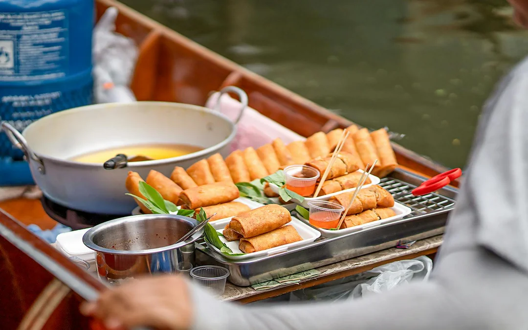 Damnoen Saduak Floating Market & Maeklong Railway Market Full-Day Guided Tour Image 9