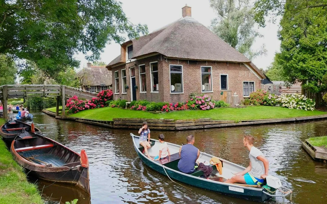 From Amsterdam: Private Day Trip to Giethoorn or Zaanse Schans Windmills Image 1