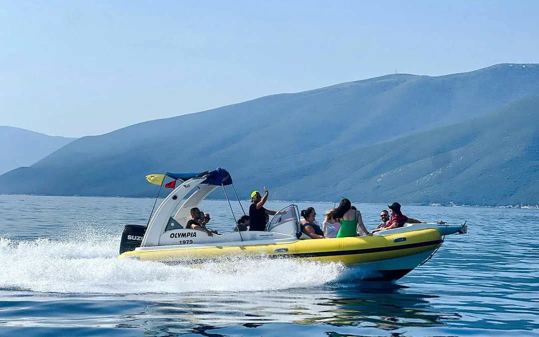 From Vlore: Unknown Escape Party Boat Cruise with Drinks, Music & Secret Swim Stops Image 3