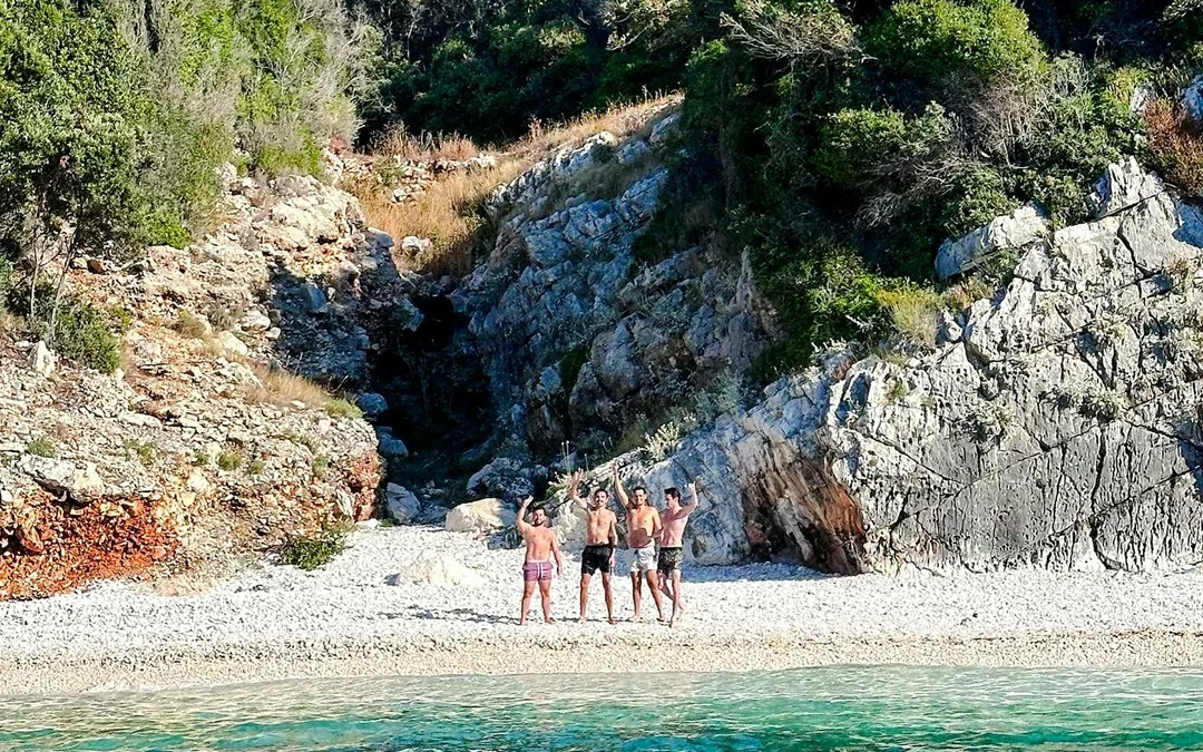From Vlore: Unknown Escape Party Boat Cruise with Drinks, Music & Secret Swim Stops Image 5