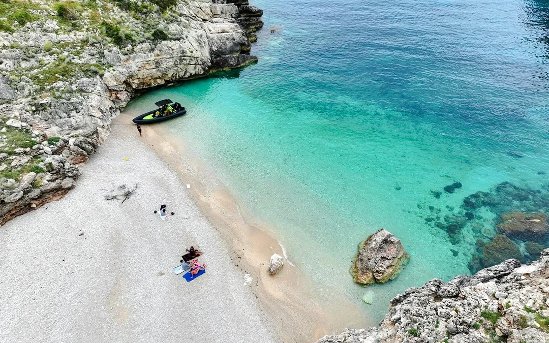 From Vlore: Unknown Escape Party Boat Cruise with Drinks, Music & Secret Swim Stops Image 8