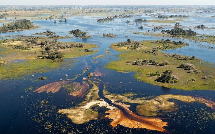 Okavango Delta Doors-Off Helicopter Tour with Champagne Island Stop Image 4