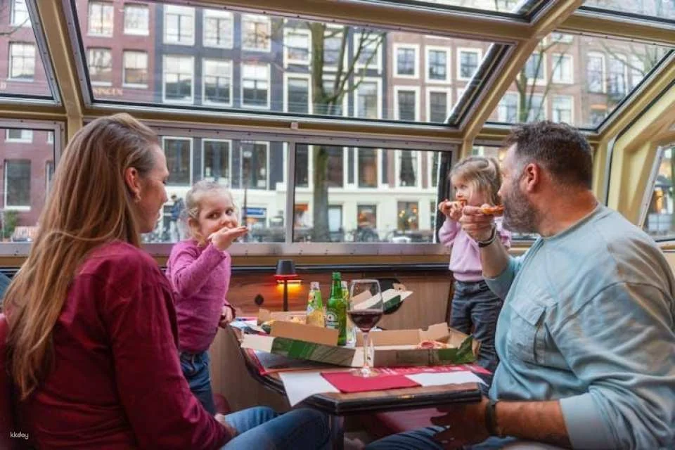 Pizza canal cruise in Amsterdam