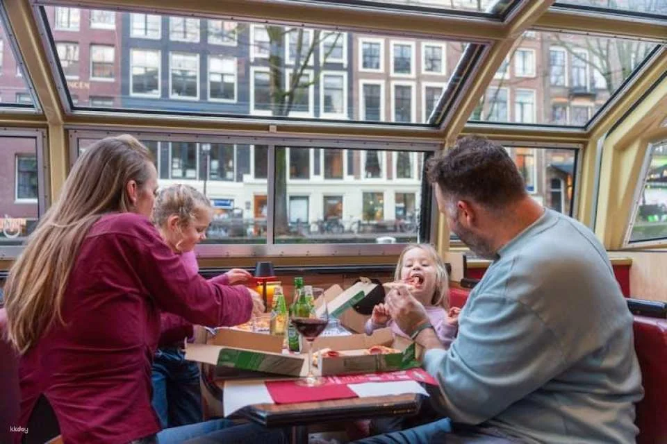 Pizza canal cruise in Amsterdam