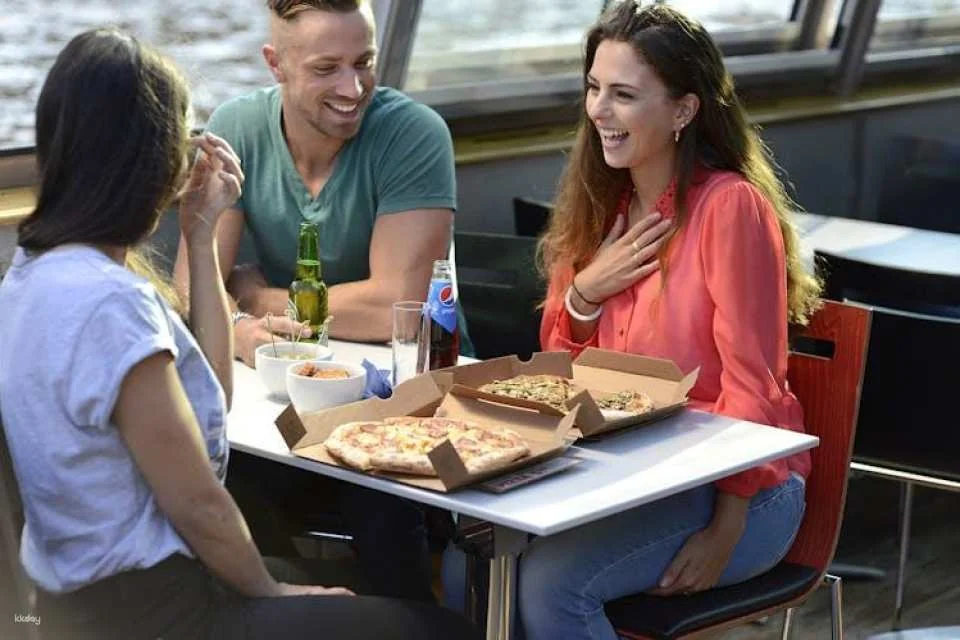 Pizza canal cruise in Amsterdam