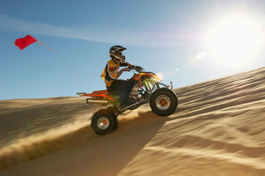 Premium Doha Desert Safari with Dune Bashing, Sandboarding, Camel Ride, Quad Biking & Inland Sea Image 11