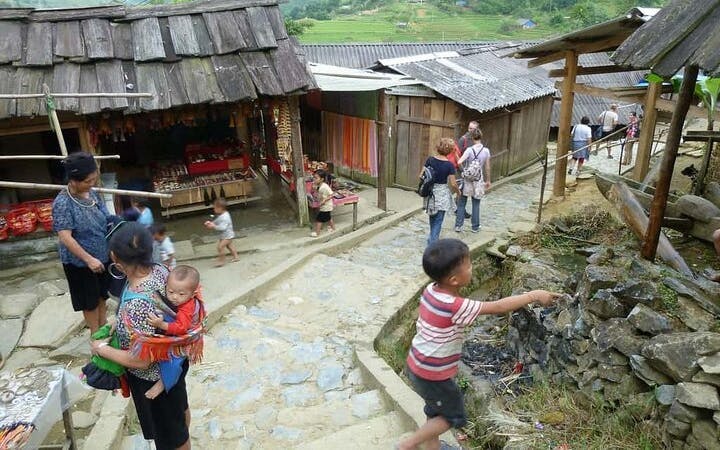 Sa Pa Group Tour of Cat Cat Village, Silver Waterfall, Love Waterfall, and Lonely Tree with Local Meal and Bottled Water Image 2