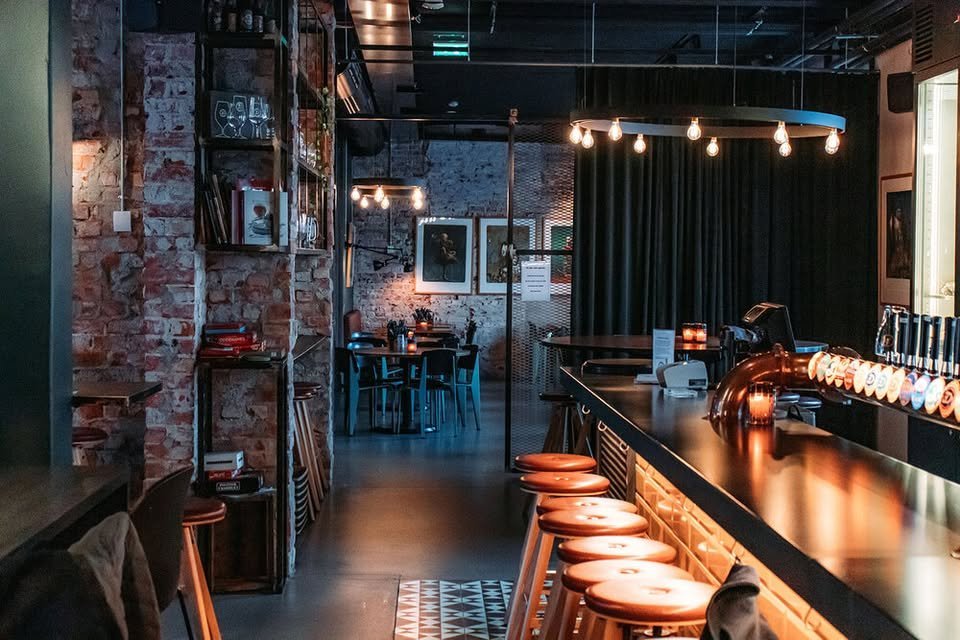 May be an image of lighting, drink and indoors