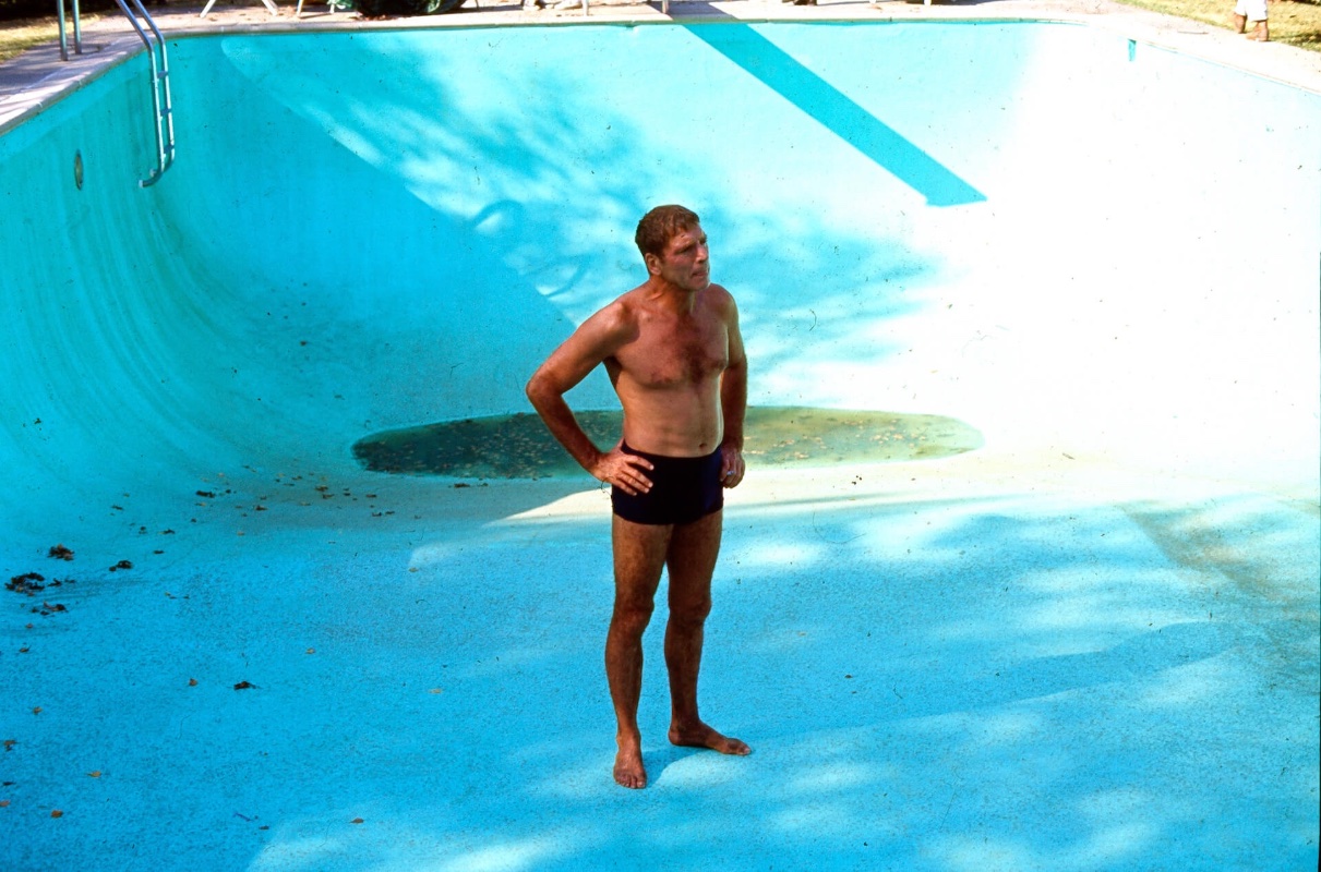 May be an image of swimming, skateboard and pool