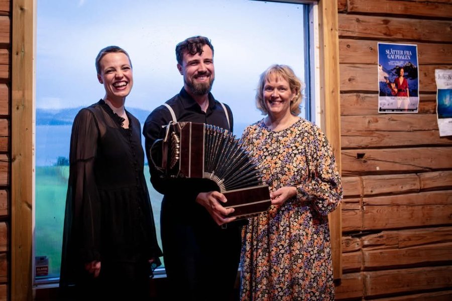 May be an image of accordion and text