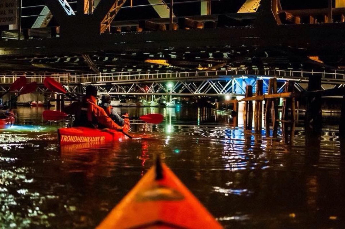 May be an image of 2 people and kayak